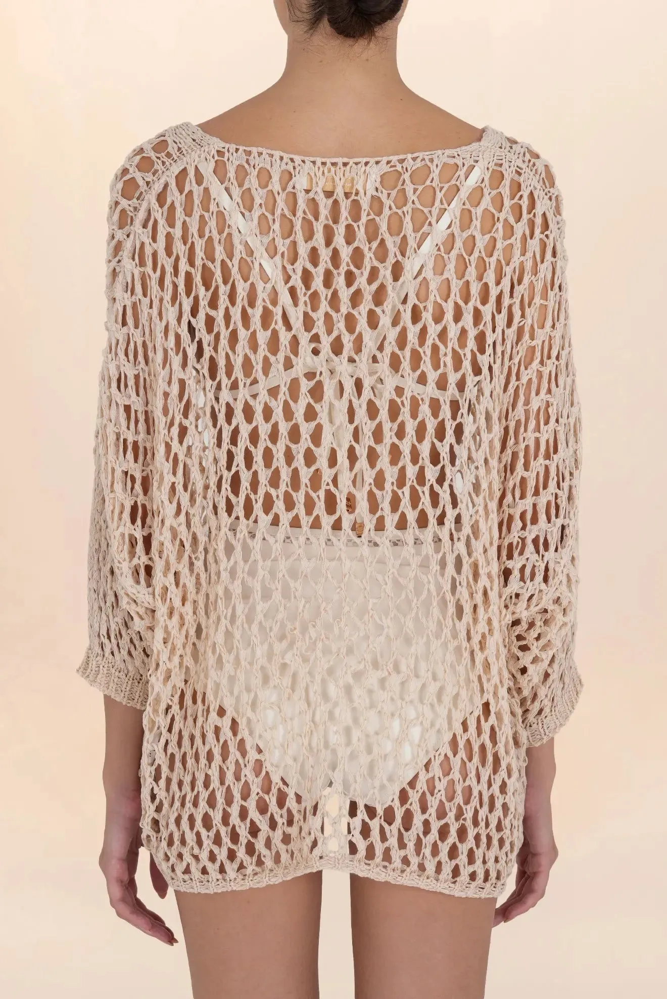 Large crochet blouse in natural tone
